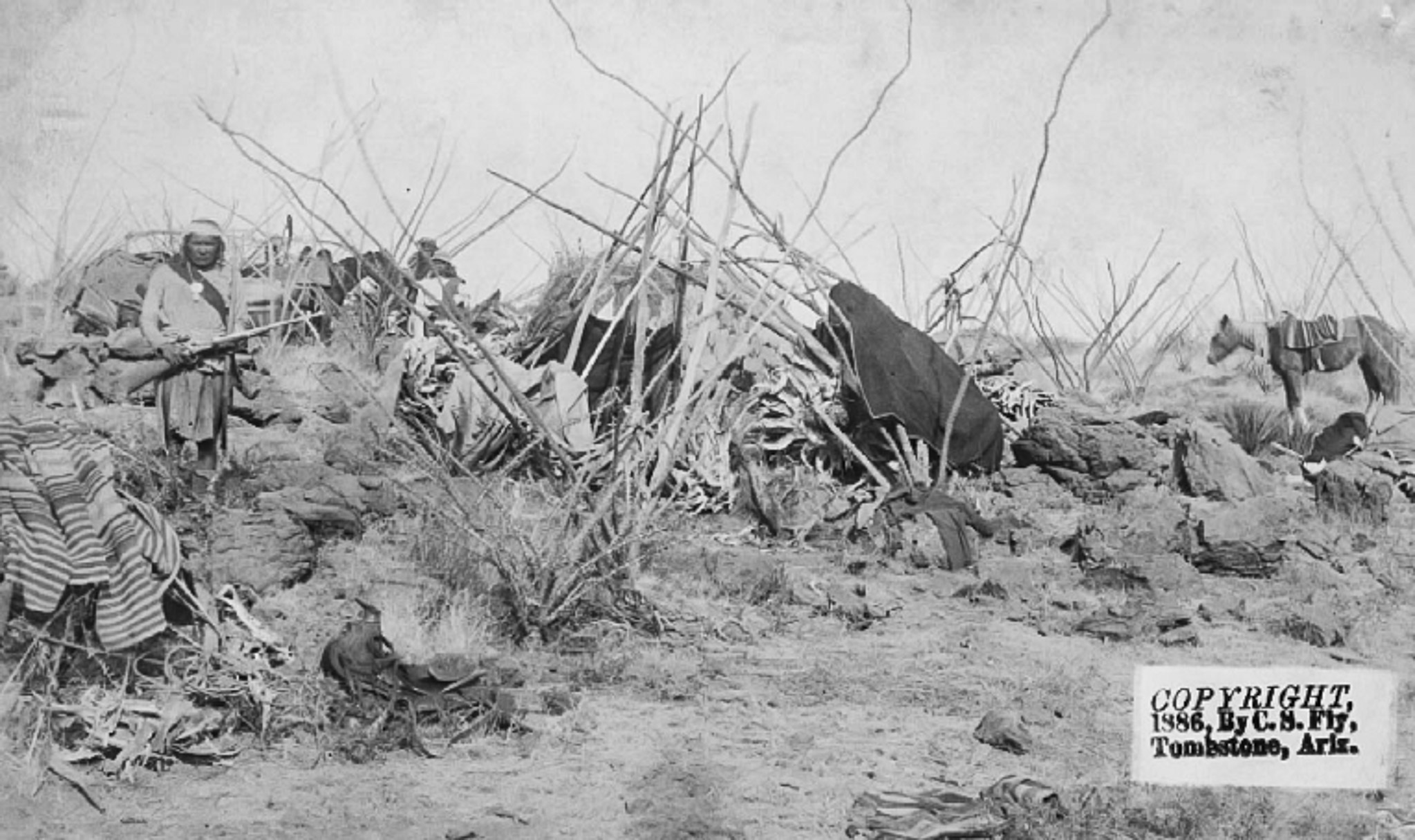 Figure 3. Fly’s 1886 photograph no. 173, entitled ‘Geronimo’s camp with sentinel’ (taken at Geronimo’s surrender at Cañon de los Embudos, Sonora, Mexico, which occurred on 25-27 March 1886. jhc)