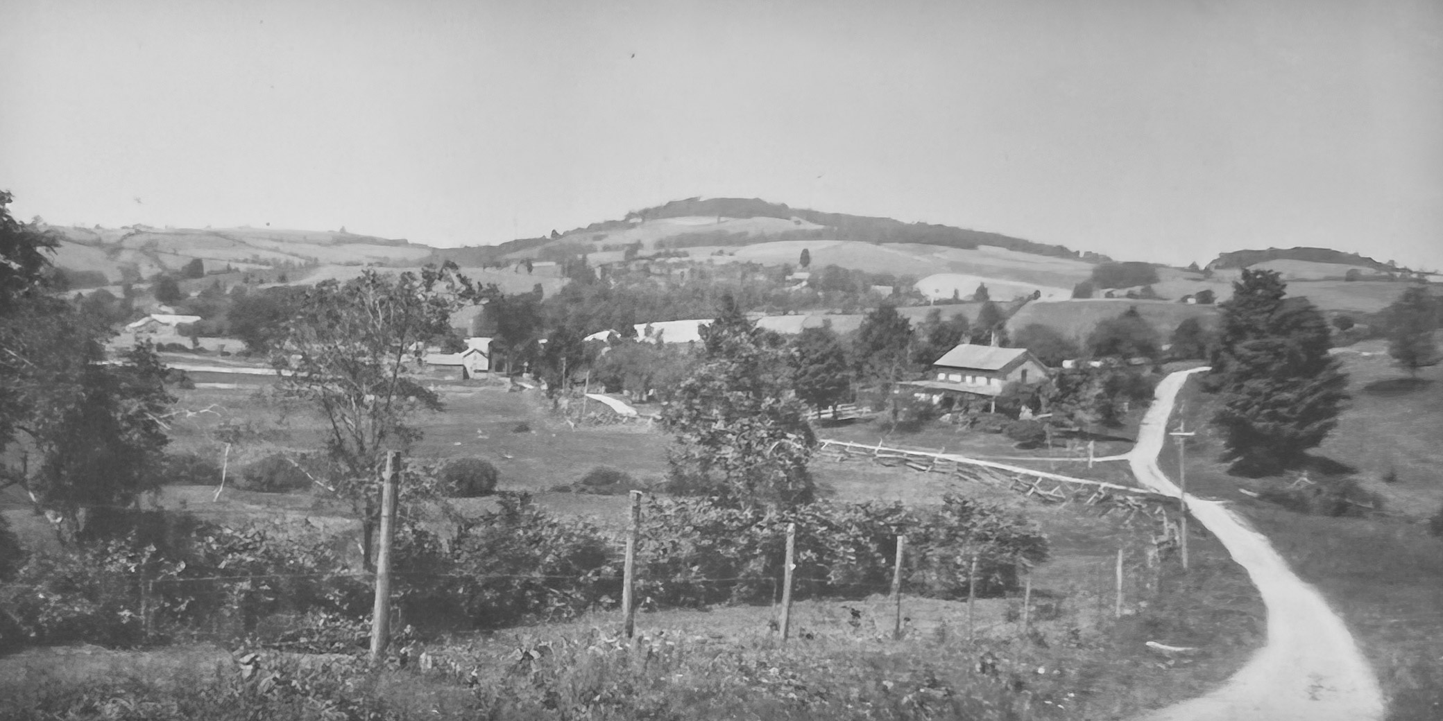 Looking toward the flats, showing telephone poles, August 27, 1904, adapted from a photo by Eberle